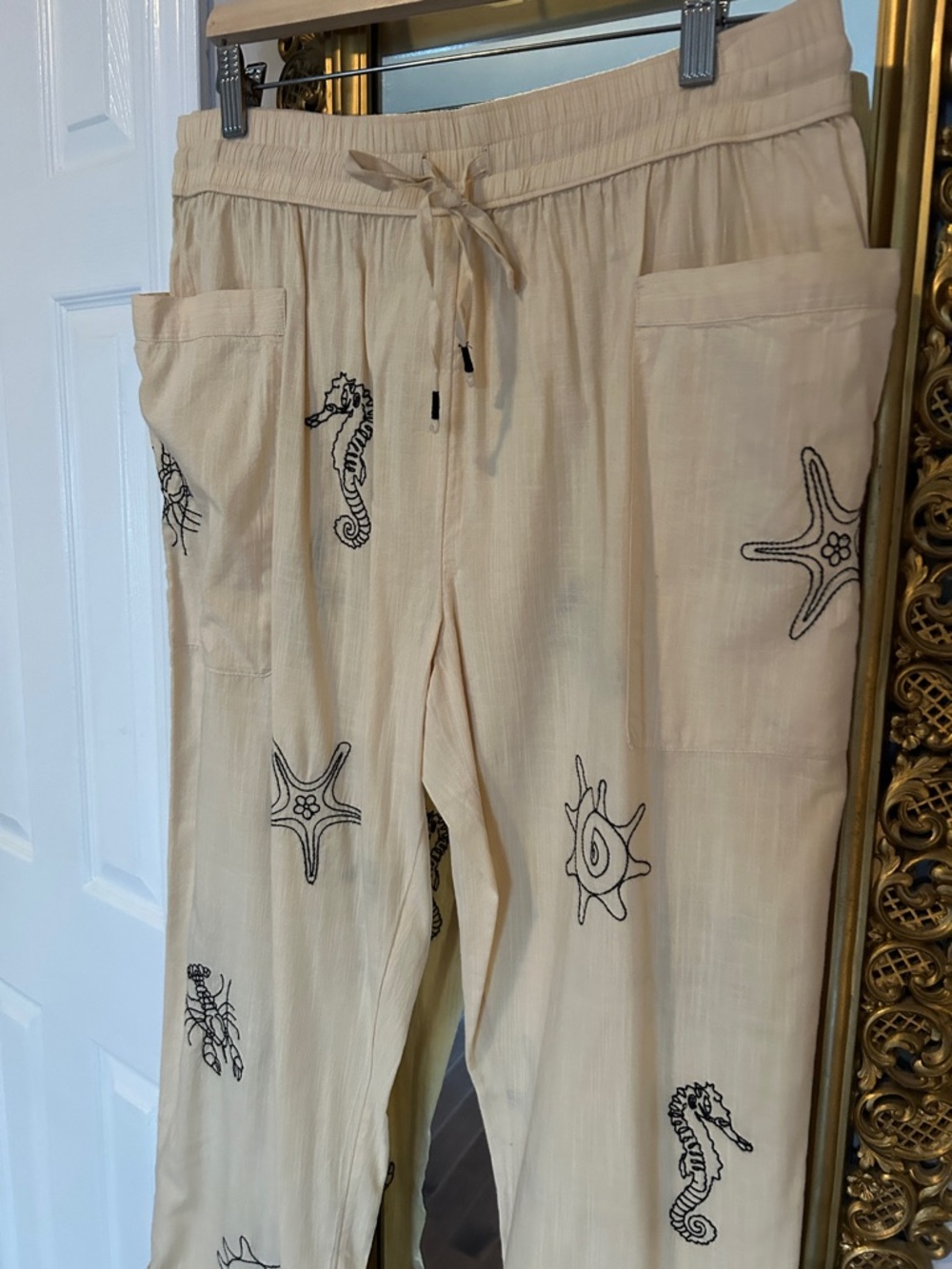 Anthropologie Cream Beach Coverup Pants with Black Sea Creature Embroidery